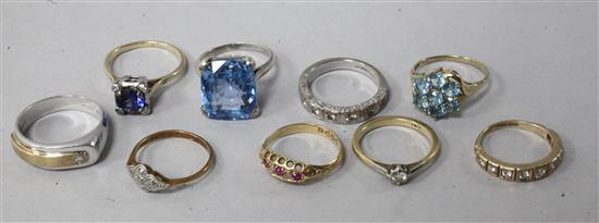 Four 18ct gold gem set rings, three 9ct rings and two other rings.